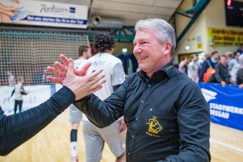 Uwe Saegeling cheering during the match in the Handball 2 Bundesliga Mens Season 2018 2019 between Dessau Rosslauer HV 06 and HC Elbflorenz 2016 in the Anhalt Arena on 31 March 2019 in Dessau Rosslau Saxony Anhalt Germany
