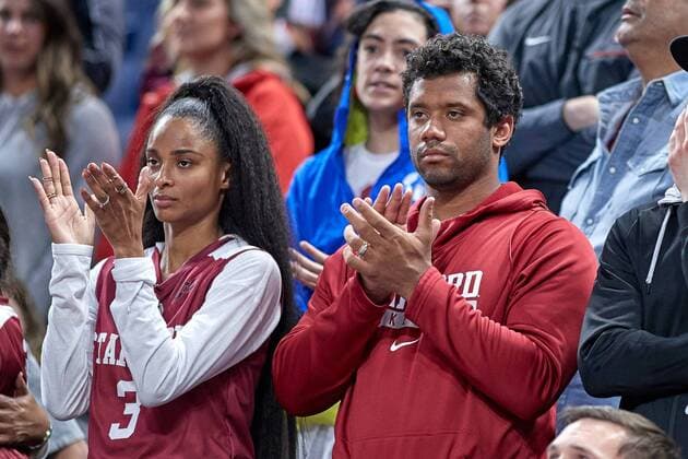 CHICAGO, IL - MARCH 30: Wisconsin University alumni and Seattle Seahawks quarterback Russell Wilson is seen with his wife Ciara celebrate in game action during the Women s NCAA College League USA Division I Championship - Third Round game between the Missouri State Lady Bears and the Stanford Cardinal on March 30, 2019 at the Wintrust Arena in Chicago, IL. (Photo by Robin Alam Icon Sportswire) NCAA BASKETBALL: MAR 30 Div I Women s Championship - Third Round - Missouri State v Stanford Cardinal Icon164033019172