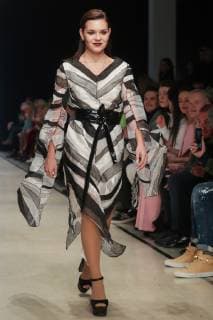 MOSCOW, RUSSIA â€“ APRIL 1, 2019: Olympic champion in Figure skating Eiskunstlauf Adelina Sotnikova showcases young fashion designers creations during a runway show as part of Mercedes-Benz Fashion Week Russia at the Manege Central Exhibition Hall. Vyacheslav Prokofyev TASS  90423179st