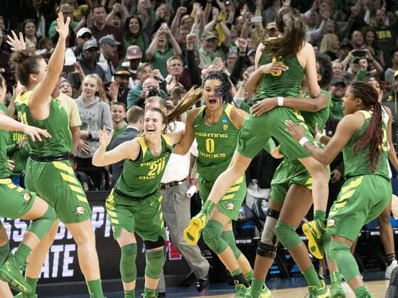 PORTLAND, OR - MARCH 31: Oregon Ducks guard Sabrina Ionescu (20) reacts with her teammate Oregon Ducks forward Satou Sabally (0) after the NCAA College League USA Division I Women s Championship Elite Eight round basketball game between the Oregon Ducks and Mississippi State Bulldogs on March 31, 2019 at Moda Center in Portland, Oregon. (Photo by Joseph Weiser Icon Sportswire) NCAA BASKETBALL: MAR 31 Div I Women s Championship - Quarterfinals - Oregon v Mississippi State Icon190331219