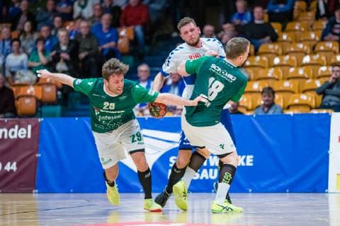 Max Bauer 29 DJK Rimpar Wölfe Bruno Zimmermann 23 Dessau Rosslauer HV 06 Steffen Kaufmann 18 DJK Rimpar Wölfe during the match in Handball 2 Bundesliga Men Season 2018 2019 between Dessau Rosslauer HV 06 and DJK Rimpar Wölfe in the Anhalt Arena on 5 April 2019 in Dessau Rosslau Sachsen Anhalt Germany