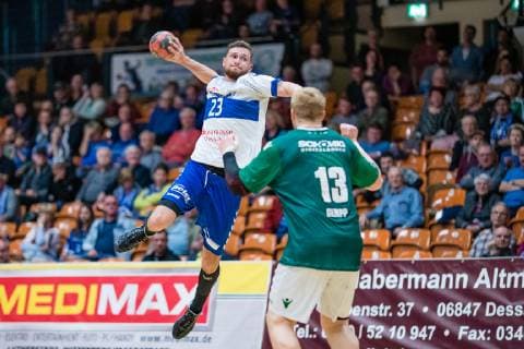 Bruno Zimmermann 23 Dessau Rosslauer HV 06 Patrick Gempp 13 DJK Rimpar Wölfe during the match in Handball 2 Bundesliga Men Season 2018 2019 between Dessau Rosslauer HV 06 and DJK Rimpar Wölfe in the Anhalt Arena on 5 April 2019 in Dessau Rosslau Sachsen Anhalt Germany