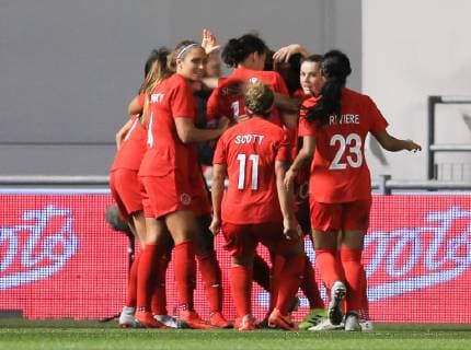 5th April 2019, Academy Stadium, Manchester, England; Womens International football friendly, England versus Canada; Christine Sinclair of Canada celebrates with her team mates after scoring to give her side a 0-1 lead after 83 minutes  ActionPlus12121035 DavidxBlunsden