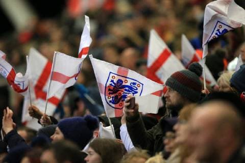 5th April 2019, Academy Stadium, Manchester, England; Womens International football friendly, England versus Canada; England fans wave St George flags as their team chase a 0-1 deficit late in the match  ActionPlus12121048 DavidxBlunsden