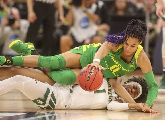 April 5, 2019 - Tampa, Florida, U.S. - DIRK SHADD Times.Oregon Ducks forward Satou Sabally (0) falls over Baylor Lady Bears forward NaLyssa Smith (1) while chasing the ball during the first half of their NCAA College League USA Women s Final Four semi-final game Friday, April 5, 2019 in Tampa. Florida News - April 5, 2019 - ZUMAs70_ 90531620st Copyright: xDirkxShaddx