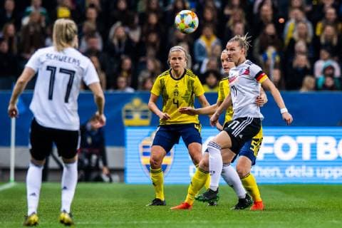 190406 Hanna Glas of Sweden and Alexandra Popp of Germany during the women?s international friendly football match between Sweden and Germany on April 6 2019 in Stockholm Photo Simon Hastegard BILDBYRAN 180019,  Copyright: SIMONxHASTEGARD BB190406SH001