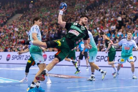Hamburg Germany 06 April 2019 REWE Final 4 DHB Cup Semifinal TSV Hannover Burgdorf vs SC Magdeburg vs Piotr Chrapkowski Magdeburg Evgeni Pevnov Hannover Hamburg Barclaycard Arena Hamburg Germany