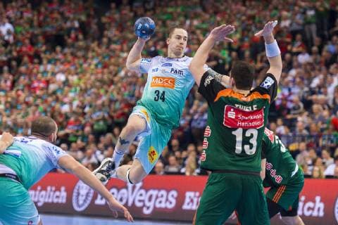 Hamburg Germany 06 April 2019 REWE Final 4 DHB Cup Semifinal TSV Hannover Burgdorf vs SC Magdeburg vs Michael Damgaard Magdeburg Joshua Thiele Hannover Hamburg Barclaycard Arena Hamburg Germany