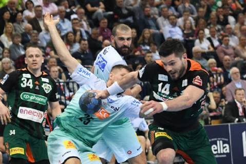 HBL DHB Cup Semifinal TSV Hannover Burgdorf vs SC Magdeburg 06 04 19 Hamburg HBL DHB Cup Final Four 2019 Semifinal TSV Hannover Burgdorf vs SC Magdeburg Evgeni Pevnov Hannover 25 tries to beat Marko Bezjak Magdeburg 23 nordphoto xWitke nph00002