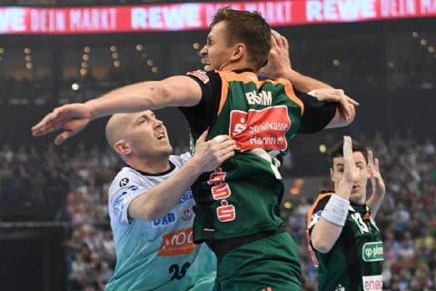 HBL DHB Cup Semifinal TSV Hannover Burgdorf vs SC Magdeburg 06 04 19 Hamburg HBL DHB Cup Final Four 2019 Semifinal TSV Hannover Burgdorf vs SC Magdeburg in picture Fabian Boehm Böhm Hannover 20 tries to prevail against Robert Weber Magdeburg 28 nordphoto xWitke nph00002