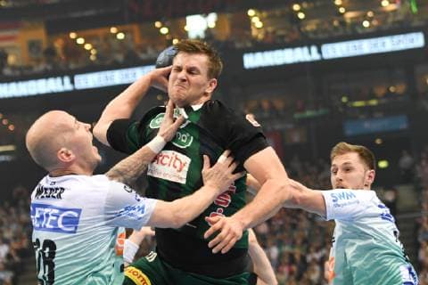 HBL DHB Cup Semifinal TSV Hannover Burgdorf vs SC Magdeburg 06 04 19 Hamburg HBL DHB Cup Final Four 2019 Semifinal TSV Hannover Burgdorf vs SC Magdeburg in picture Fabian Boehm Böhm Hannover 20 tries to prevail against Robert Weber Magdeburg 28 nordphoto xWitke nph00002