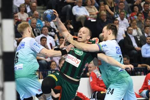 HBL DHB Cup Semifinal TSV Hannover Burgdorf vs SC Magdeburg 06 04 19 Hamburg HBL DHB Cup Final Four 2019 Semifinal TSV Hannover Burgdorf vs SC Magdeburg in picture Morten Olsen Hannover 34 tries to prevail against Matthias Musche Magdeburg 06 and Christian O Sullivan Magdeburg 24 nordphoto xWitke nph00002