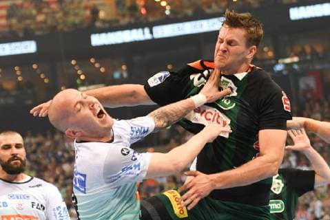 HBL DHB Cup Semifinal TSV Hannover Burgdorf vs SC Magdeburg 06 04 19 Hamburg HBL DHB Cup Final Four 2019 Semifinal TSV Hannover Burgdorf vs SC Magdeburg in picture Fabian Boehm Böhm Hannover 20 tries to prevail against Robert Weber Magdeburg 28 nordphoto xWitke nph00002