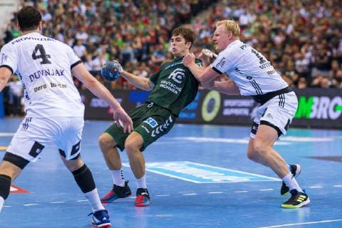 Hamburg Germany 06 April 2019 REWE Final 4 DHB Cup Semifinal THW Kiel vs Fuechse Berlin v li Domagoj Duvnjak THW Kiel Jacob Tandrup Holm Berlin Patrick Wiencek THW Kiel Hamburg Barclaycard Arena Hamburg Germany