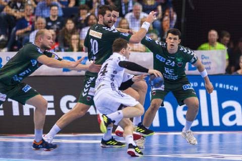 Hamburg Germany 06 April 2019 REWE Final 4 DHB Cup Semifinal THW Kiel vs Fuechse Berlin v li Paul Drux Berlin Jakov Gojun Berlin Miha Zarabec THW Kiel Frederik Simak Berlin Hamburg Barclaycard Arena Hamburg Germany