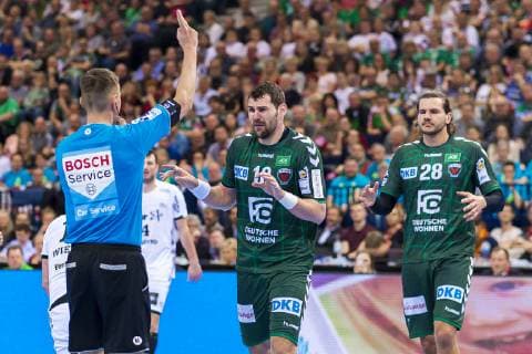 Hamburg Germany 06 April 2019 REWE Final 4 DHB Cup semi-final THW Kiel vs Fuechse Berlin Jakov Gojun Berlin receives a 2 minute penalty Hamburg Barclaycard Arena Hamburg Germany