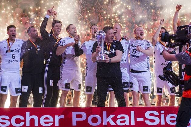 Hamburg Germany 07 April 2019 REWE Final 4 DHB Cup Final SC Magdeburg vs. THW Kiel Coach Alfred Gislason THW Kiel with the Cup Cup Winner 2019 THW Kiel Hamburg Barclaycard Arena Hamburg Germany
