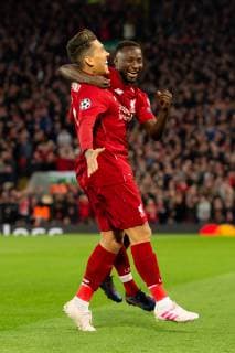 Liverpool England 09 04 2019 UEFA Champions League 2018 19 Season Round of 8 Quarter Finals Liverpool FC vs. FC Port Goal to 1-0 Scorers Sadio Mane LFC cheers with Roberto Firmino LFC DeFodi053