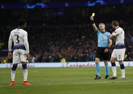 Danny Rose of Tottenham receives a yellow card from referee Bjorn Kuipers during the UEFA Champions League match at the Tottenham Hotspur Stadium, London. Picture date: 9th April 2019. Picture credit should read: Darren Staples Sportimage EDITORIAL USE ONLY. No use with unauthorised audio, video, data, fixture lists, club league logos or live services. Online in-match use limited to 120 images, no video emulation. No use in betting, games or single club league player publications. SPI-0025-0024