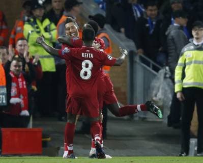 Roberto Firmino of Liverpool celebrates scoring the second goal during the UEFA Champions League match at Anfield, Liverpool. Picture date: 9th April 2019. Picture credit should read: Andrew Yates Sportimage EDITORIAL USE ONLY. No use with unauthorised audio, video, data, fixture lists, club league logos or live services. Online in-match use limited to 120 images, no video emulation. No use in betting, games or single club league player publications. SPI-0024-0027