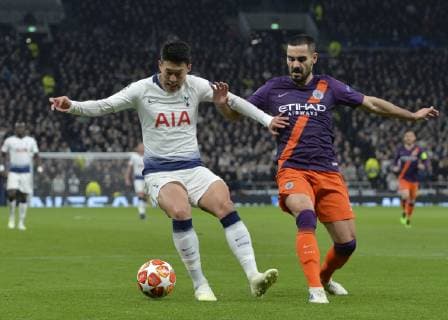 London United Kingdom 09 04 2019 UEFA Champions League 2018 19 Season Quarterfinals 1 Round Tottenham Hotspur Manchester City Son Heung Min Tottenham and Ilkay Gundogan Manchester City battle for the ball DeFodi056