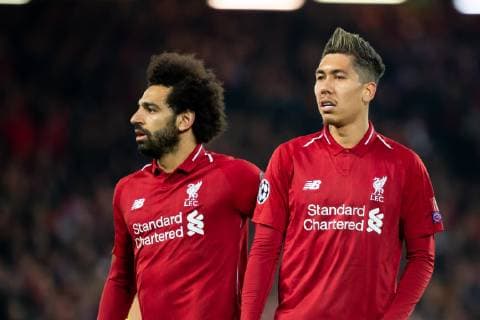 Liverpool England 09 04 2019 UEFA Champions League 2018 19 Season Round of 8 quarter finals Liverpool FC vs. FC Port Mohamed Salah LFC and Roberto Firmino LFC watching DeFodi053
