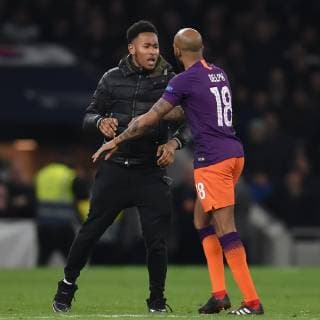 Tottenham Hotspur v Manchester City UEFA Champions League Fabian Delph of Manchester City is confronted by a pitch invader during the UEFA Champions League match at the Tottenham Hotspur Stadium, London Content Not Available For UK Newspapers Copyright: xMartynxHaworthx FIL-13108-0175