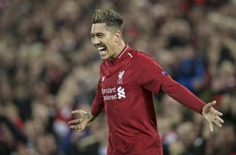 (190410) -- LIVERPOOL, April 10, 2019 (Xinhua) -- Liverpool s Roberto Firmino celebrates during the UEFA Champions League Quarter-final first leg match between Liverpool FC and FC Porto at Anfield in Liverpool, Britain on April 9, 2019. Liverpool won 2-0. (Xinhua) FOR EDITORIAL USE ONLY. NOT FOR SALE FOR MARKETING OR ADVERTISING CAMPAIGNS. NO USE WITH UNAUTHORIZED AUDIO, VIDEO, DATA, FIXTURE LISTS, CLUB LEAGUE LOGOS OR LIVE SERVICES. ONLINE IN-MATCH USE LIMITED TO 45 IMAGES, NO VIDEO EMULATION. NO USE IN BETTING, GAMES OR SINGLE CLUB LEAGUE PLAYER PUBLICATIONS. (SP)BRITAIN-LIVERPOOL-FOOTBALL-UEFA CHAMPIONS LEAGUE-LIVERPOOL VS FC PORTO
