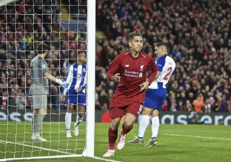 (190410) -- LIVERPOOL, April 10, 2019 (Xinhua) -- Liverpool s Roberto Firmino celebrates during the UEFA Champions League Quarter-final first leg match between Liverpool FC and FC Porto at Anfield in Liverpool, Britain on April 9, 2019. Liverpool won 2-0. (Xinhua) FOR EDITORIAL USE ONLY. NOT FOR SALE FOR MARKETING OR ADVERTISING CAMPAIGNS. NO USE WITH UNAUTHORIZED AUDIO, VIDEO, DATA, FIXTURE LISTS, CLUB LEAGUE LOGOS OR LIVE SERVICES. ONLINE IN-MATCH USE LIMITED TO 45 IMAGES, NO VIDEO EMULATION. NO USE IN BETTING, GAMES OR SINGLE CLUB LEAGUE PLAYER PUBLICATIONS. (SP)BRITAIN-LIVERPOOL-FOOTBALL-UEFA CHAMPIONS LEAGUE-LIVERPOOL VS FC PORTO