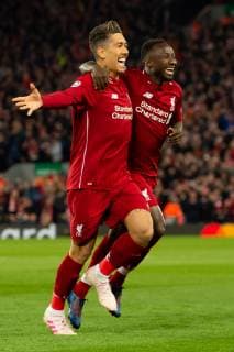 Liverpool England 09 04 2019 UEFA Champions League 2018 19 Season Round of 8 Quarter Finals Liverpool FC vs FC Port Goal to 1 0 Scorer Naby Keita LFC cheers with Roberto Firmino LFC DeFodi053