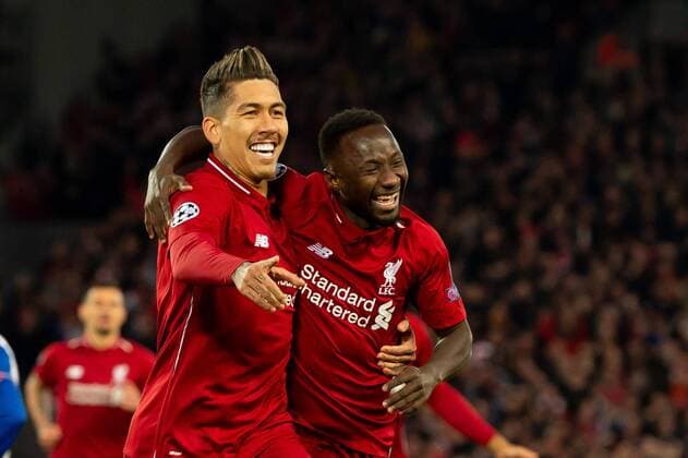 Liverpool England 09 04 2019 UEFA Champions League 2018 19 Season Round of 8 Quarter Finals Liverpool FC vs FC Port Goal to 1 0 Scorer Naby Keita LFC cheers with Roberto Firmino LFC DeFodi053