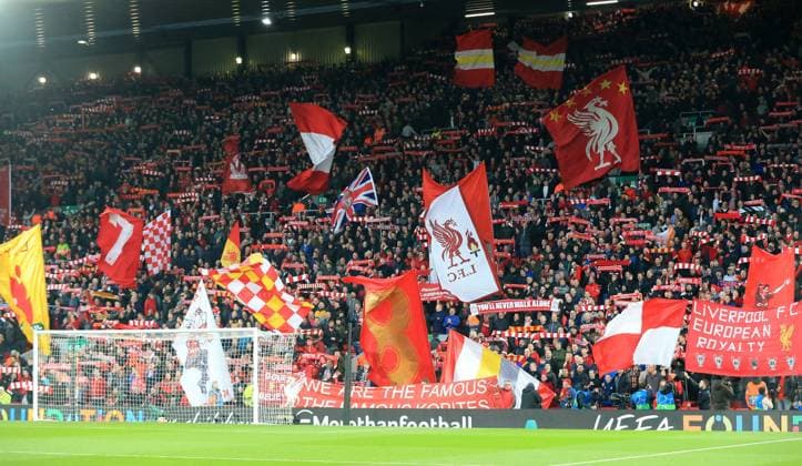 9th April 2019, Anfield, Liverpool, England; UEFA Champions League football, quarter final 1st leg, Liverpool versus FC Porto; Liverpool fans on the Kop wave flags and banners as they sing You ll Never Walk Alone" before the kick off  ActionPlus12122557 DavidxBlunsden