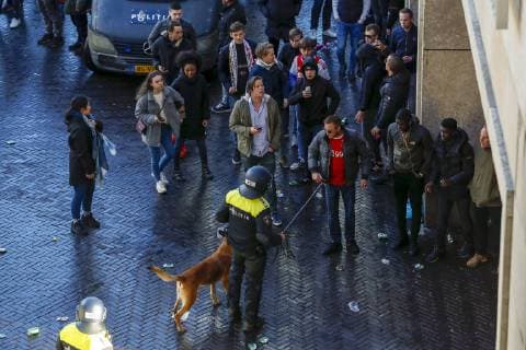 police with Ajax fans during the UEFA Champions League quarter final match Ajax Amsterdam and Juventus FC at the Johan Cruijff Arena on April 10, 2019 in Amsterdam, The Netherlands UEFA Champions League 2018 2019 xVIxVIxImagesx xMauricexvanxSteenxIVx 14158626