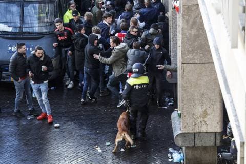 police with Ajax fans during the UEFA Champions League quarter final match Ajax Amsterdam and Juventus FC at the Johan Cruijff Arena on April 10, 2019 in Amsterdam, The Netherlands UEFA Champions League 2018 2019 xVIxVIxImagesx xMauricexvanxSteenxIVx 14158631