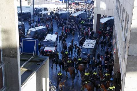 police with Ajax fans during the UEFA Champions League quarter final match Ajax Amsterdam and Juventus FC at the Johan Cruijff Arena on April 10, 2019 in Amsterdam, The Netherlands UEFA Champions League 2018 2019 xVIxVIxImagesx xMauricexvanxSteenxIVx 14158643