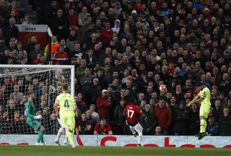 Luis Suarez of Barcelona heads the first goal during the UEFA Champions League match at Old Trafford, Manchester. Picture date: 10th April 2019. Picture credit should read: Darren Staples Sportimage EDITORIAL USE ONLY. No use with unauthorised audio, video, data, fixture lists, club league logos or live services. Online in-match use limited to 120 images, no video emulation. No use in betting, games or single club league player publications. SPI-0026-0020