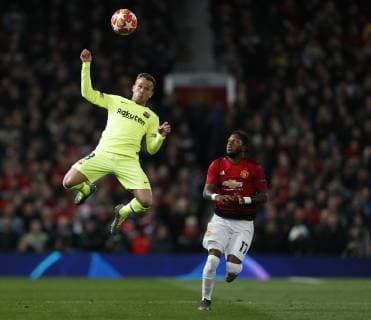 Arthur of Barcelona rises above Fred of Manchester United ManU during the UEFA Champions League match at Old Trafford, Manchester. Picture date: 10th April 2019. Picture credit should read: Darren Staples Sportimage EDITORIAL USE ONLY. No use with unauthorised audio, video, data, fixture lists, club league logos or live services. Online in-match use limited to 120 images, no video emulation. No use in betting, games or single club league player publications. SPI-0026-0033