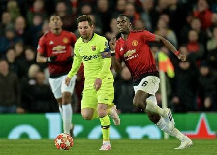 (190411) -- MANCHESTER, April 11, 2019 (Xinhua) -- Barcelona s captain Lionel Messi (L) vies with Manchester United ManU s Paul Pogba during the UEFA Champions League Quarter-Final first leg match between Manchester United and FC Barcelona Barca at Old Trafford in Manchester, Britain on April 10, 2019. Barcelona won 1-0. (Xinhua) FOR EDITORIAL USE ONLY. NOT FOR SALE FOR MARKETING OR ADVERTISING CAMPAIGNS. NO USE WITH UNAUTHORIZED AUDIO, VIDEO, DATA, FIXTURE LISTS, CLUB LEAGUE LOGOS OR LIVE SERVICES. ONLINE IN-MATCH USE LIMITED TO 45 IMAGES, NO VIDEO EMULATION. NO USE IN BETTING, GAMES OR SINGLE CLUB LEAGUE PLAYER PUBLICATIONS. (SP)BRITAIN-MANCHESTER-FOOTBALL-CHAMPIONS LEAGUE-QUARTERFINAL-MAN UNITED VS BARCELONA 