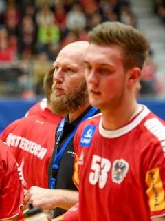 HANDBALL - EHF EURO Cup, AUT vs ESP DORNBIRN,AUSTRIA,11.APR.19 - HANDBALL - EHF EURO Cup, OEHB international match Länderspiel Austria vs Spain. Image shows head coach Ales Pajovic and Nikola Bilyk (AUT). GEPAxpictures xOliverxLerch