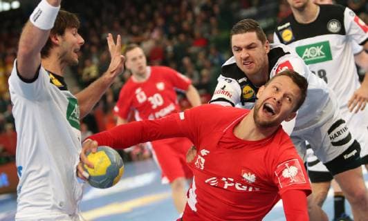 Kamil Syprzak Poland vs. Hendrik Pekeler Germany at the European Championship qualifying match Germany vs. Poland of the men on 13 04 19 in the Gerry Weber Stadium in Halle Westphalia Handball European Championship qualifying Germany Poland