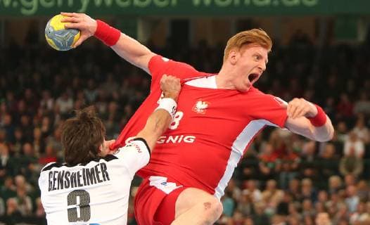 Tomasz Gebala Poland vs. Uwe Gensheimer Germany at the European Championship Qualifier Germany vs. Poland of the Men on 13 04 19 at the Gerry Weber Stadium in Halle Westfalen Handball European Championship Qualifier Germany Poland