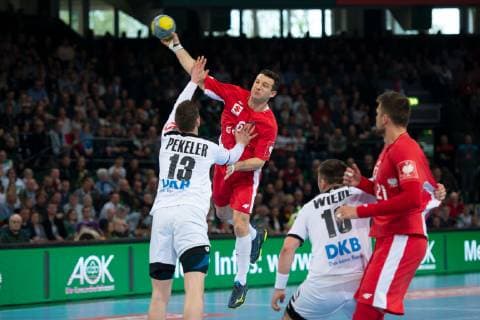 Halle Westf Germany 13 04 2019 DHB Qualifying match 2018 2019 Germany vs Poland L M Hendrik Pekeler Germany Przemyslaw Krajewski Poland Halle Westfalia Germany Gerry Weber Stadium