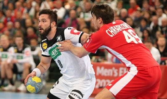 Tim Suton Germany vs. Piotr Chrapkowski Poland at the European Championship Qualifier Germany vs. Poland of the Men on 13 04 19 in the Gerry Weber Stadium in Halle Westfalen Handball European Championship Qualifier Germany Poland