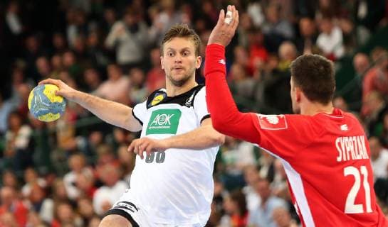 Fabian Böhm Germany vs. Kamil Syprzak Poland at the European Championship Qualifier Germany vs. Poland of the Men on 13 04 19 in the Gerry Weber Stadium in Halle Westfalen Handball European Championship Qualifier Germany Poland