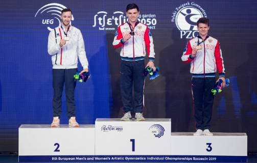 April 13, 2019 - Szczecin, Poland - Artem Dolgopyat (ISR),Artur Dalaloyan (RUS),Dmitrii Lankin (RUS) during the European Women s and Men s Artistic Gymnastics Championships, in Szczecin, Poland, on April 13, 2019. European Women s And Men s Artistic Gymnastics Championships - Day 4  - ZUMAn230 20190413_zaa_n230_932 Copyright: xFotoxOlimpikx