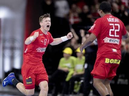 Lasse Svan and Mads Mensah Larsen during the European Championship qualifier in mens handball between Denmark and Montenegro in the Royal Arena Saturday 13 April 2019 Copenhagen Denmark,  Copyright: fotograf@clausbech.dk ClausxBechx COP102 spdk20190413-214714-L