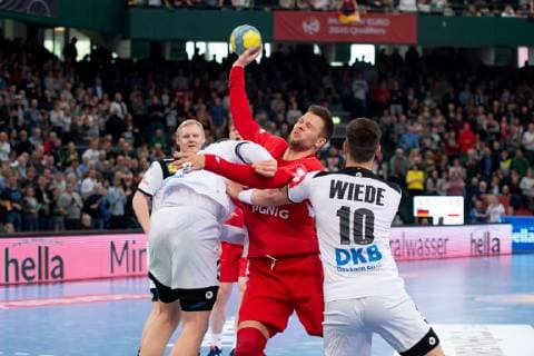 Halle Westf Germany 13 04 2019 DHB Qualifying match 2018 2019 Germany vs Poland L R Hendrik Pekeler Germany Kamil Syprzak Poland Fabian Wiede Germany Halle Westfalen Germany Gerry Weber Stadium