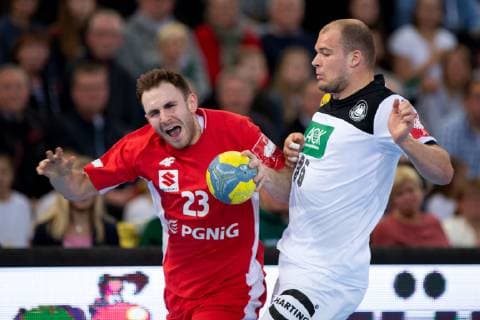 Halle Westf Germany 13 04 2019 DHB Qualifying match 2018 2019 Germany vs Poland L R Arkadiusz Moryto Poland Paul Drux Germany Halle Westf Nordrhein Westfalen Germany Gerry Weber Stadium