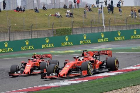 Shanghai China 14 04 2019 Formula 1 Formula 1 Formula 1 China Grand Prix Sebastian Vettel GER 5 Scuderia Ferrari overtakes Charles Leclerc MCO 16 Scuderia Ferrari DeFodi506