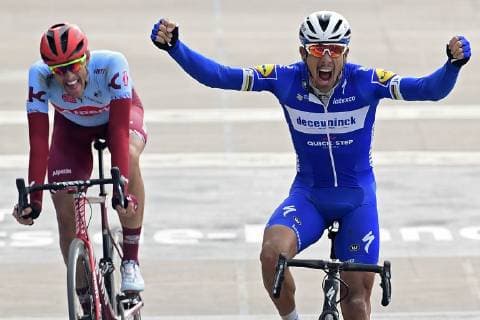 GILBERT Philippe (BEL) of DECEUNINCK - QUICK - STEP celebrates the win before POLITT Nils (GER) of TEAM KATUSHA ALPECIN CYCLISME : Paris Roubaix - 14 04 2019 PhotoNews Panoramic 
